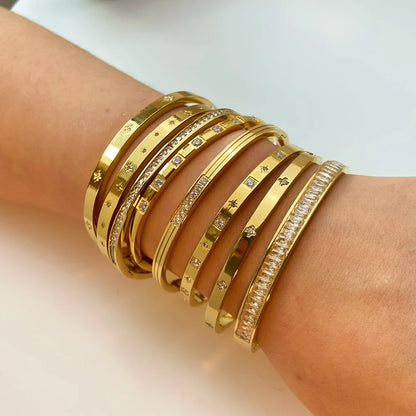 XPEL Gold Bangles Bracelets